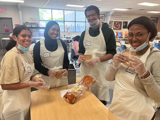 Bonner students volunteering at TASK. (Photo courtesy of Monica Smith)