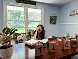 Owner, Liz Prior, on call at her business, The Learning Center. (Photo by Giya Khurana)