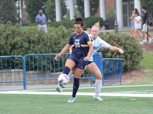 Fifth year forward Emma Pascarella fighting for the ball (Photo courtesy of Elizabeth Gladstone / Multimedia Coordinator).