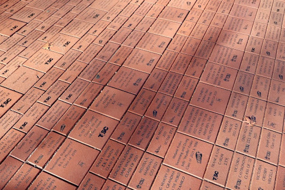 <p><em>Alumni Grove allows students to preserve the legacy of their time at the College. (Photo courtesy of Erin Reilly)</em></p>