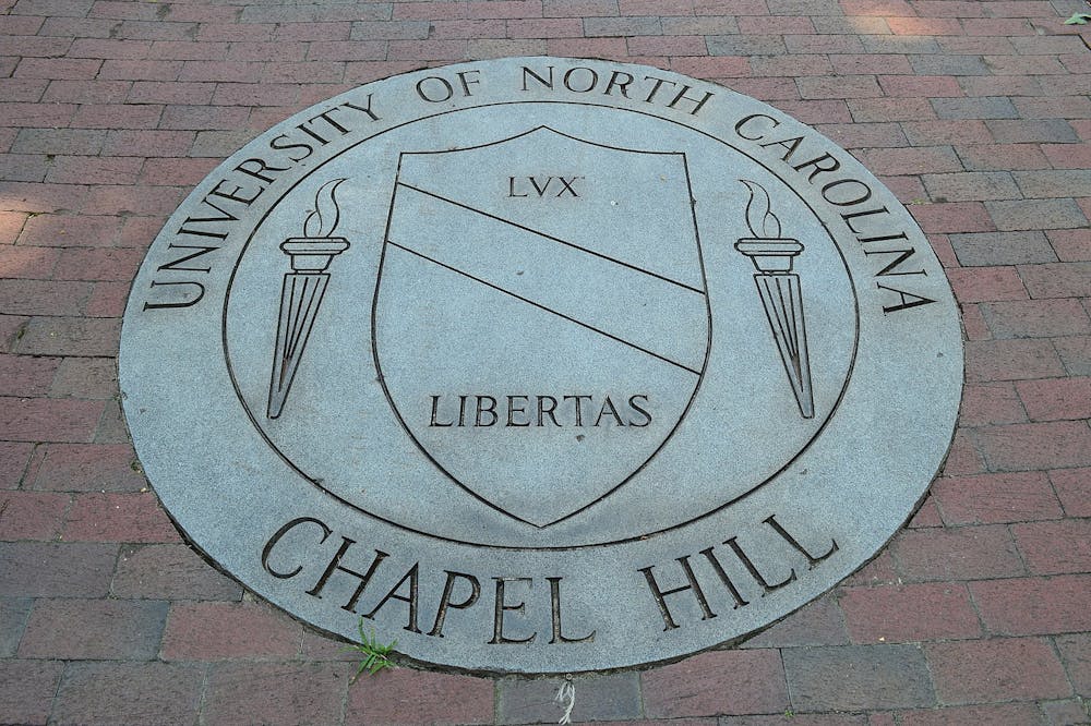 <p><em>A graduate student has been charged with first-degree murder after fatally shooting his faculty advisor at the University of North Carolina-Chapel Hill (Photo courtesy of Wikimedia Commons/“</em><a href="https://commons.wikimedia.org/wiki/File:University_Of_North_Carolina_At_Chapel_Hill_School_Seal_(42522248).jpeg" target=""><em>University Of North Carolina At Chapel Hill School Seal</em></a><em>” by William Yeung. August 4, 2013). </em></p>