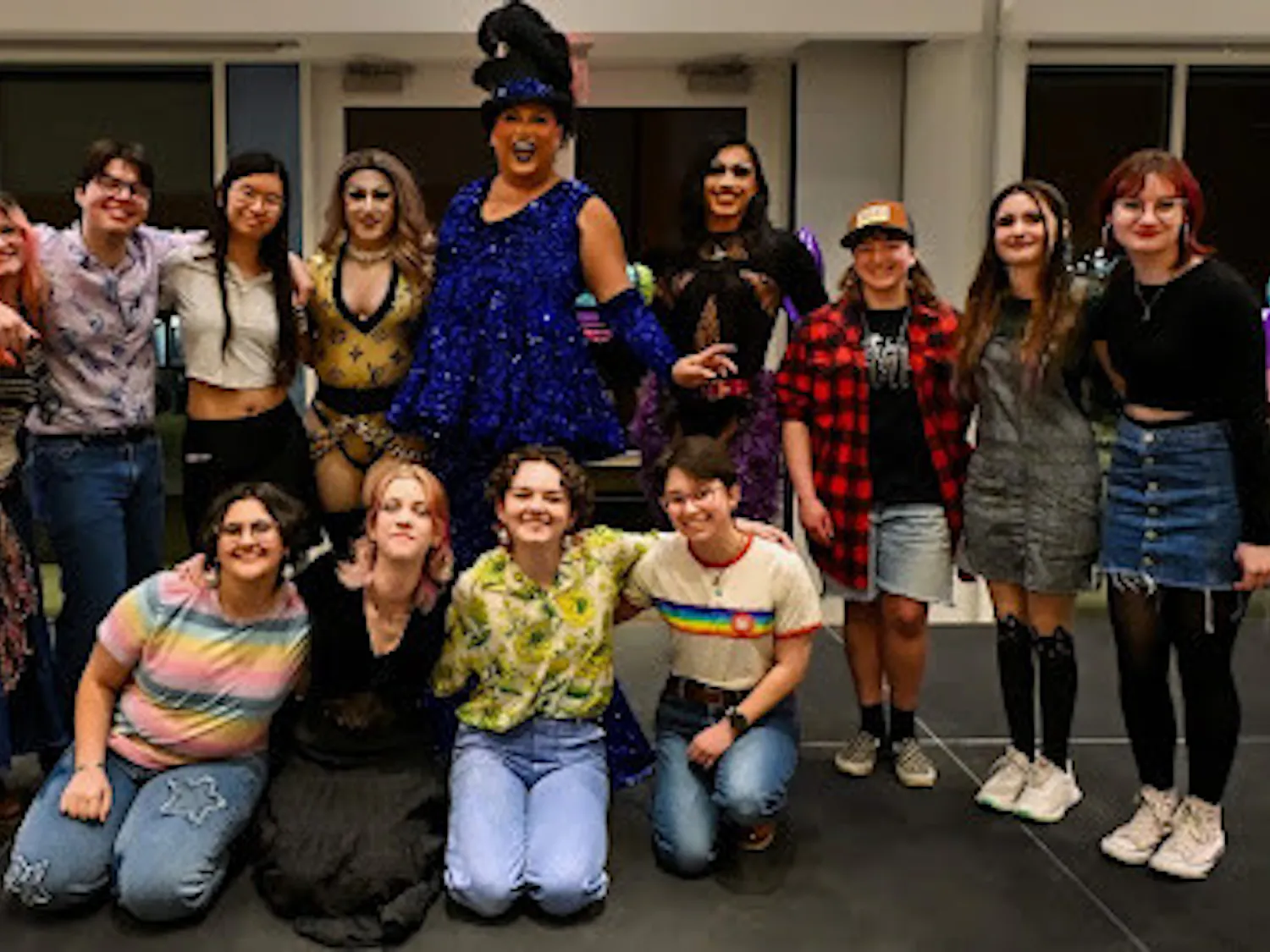 The Prism executive board poses with the queens. (Photo by Nick DeCesare)