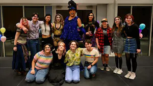 The Prism executive board poses with the queens. (Photo by Nick DeCesare)