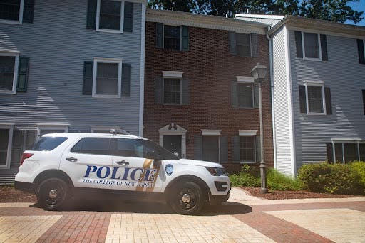 A Campus Police cruiser drives through Townhouses West at the College. (Photo by Andre Paras)