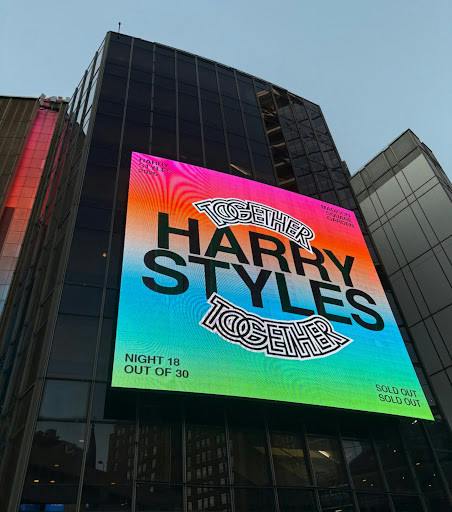 Harry Styles&#x27; billboard welcomes fans outside of Madison Square Garden. (Photo by Robyn Seltzer / Staff Writer)