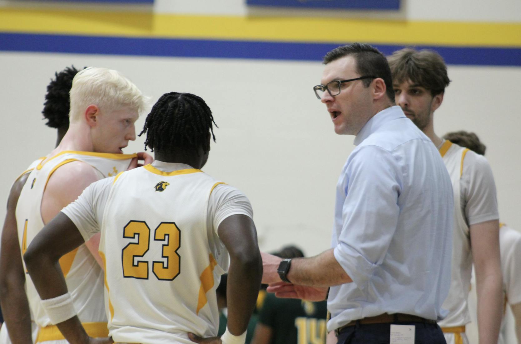 Coach Goldsmith urging his team on in a timeout (Photo courtesy of Elizabeth Gladstone / Multimedia Coordinator).