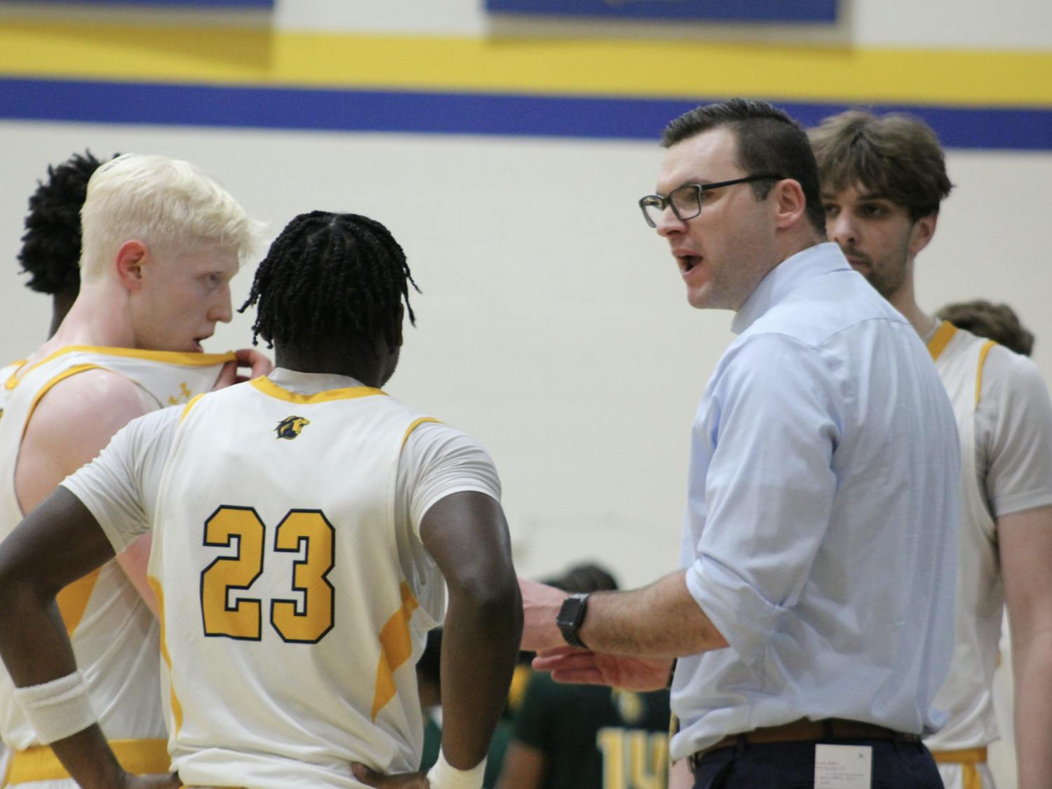 Coach Goldsmith urging his team on in a timeout (Photo courtesy of Elizabeth Gladstone / Multimedia Coordinator).