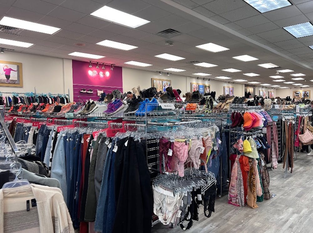 <p>Thrift stores, such as Plato’s Closet which is featured, were initially designed to benefit low-income communities, but have gained more traction among Gen Z in recent years (Photo courtesy of Riley Eisenbeil).</p>