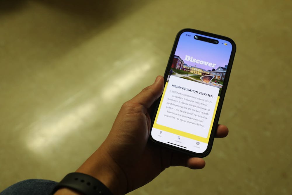 <p><em>The Visit TCNJ app is available on both iOS and Android (Photo by Andre Paras / Staff Photographer).</em></p>