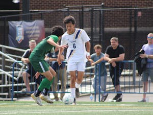 Sophomore Pablo Argueta dribbling at a defender during the Classic (Photo courtesy of Elizabeth Gladstone).