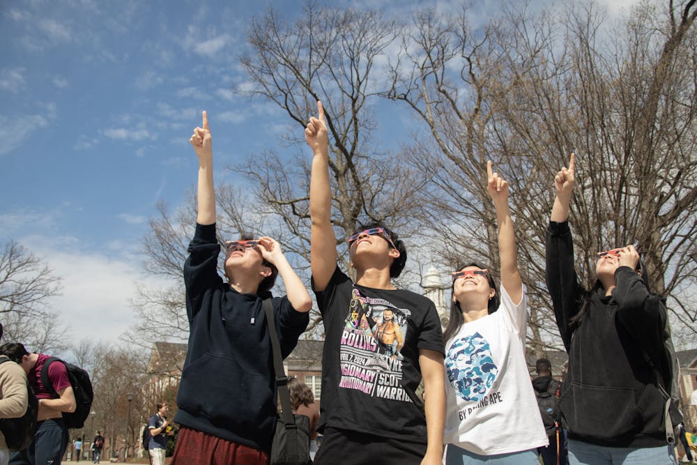 <p><em>Students gather in front of the Brower Student Center to view the solar eclipse (Photo courtesy of Anthony DiPrimo).</em></p>