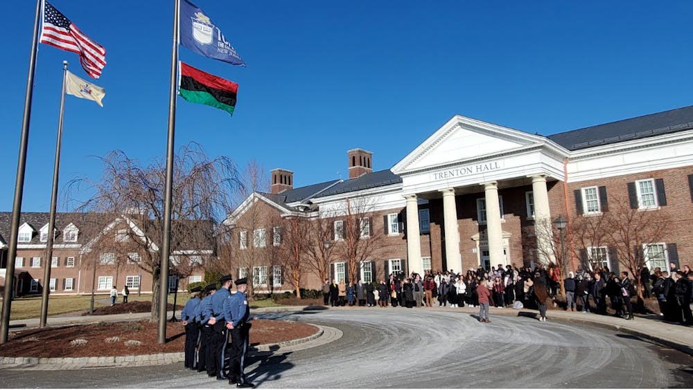 Members of the campus community gathered to witness the raising of the Pan-African flag (Photo courtesy of Catherine Gonzalez / Staff Writer).