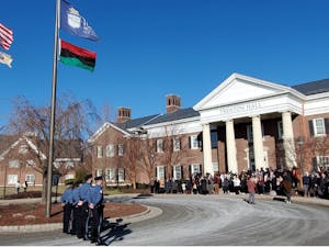 Members of the campus community gathered to witness the raising of the Pan-African flag (Photo courtesy of Catherine Gonzalez / Staff Writer).
