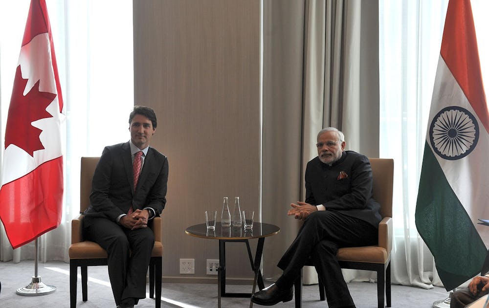 <p><em>Canadian and Indian diplomatic relations seem to be hanging by a thread, as Canadian Prime Minister Justin Trudeau formally announces that the Canadian government is investigating ties between the Indian government (Photo courtesy of Wikimedia Commons/“</em><a href="https://commons.wikimedia.org/wiki/File:The_Leader_of_the_Liberal_Party_of_Canada,_Mr._Justin_Trudeau_calls_on_the_Prime_Minister,_Shri_Narendra_Modi,_in_Toronto,_Canada_on_April_16,_2015.jpg" target=""><em>The Leader of the Liberal Party of Canada, Mr. Justin Trudeau calls on the Prime Minister, Shri Narendra Modi, in Toronto, Canada on April 16, 2015</em></a><em>” by Prime Minister’s Office. April 16, 2015). </em></p>