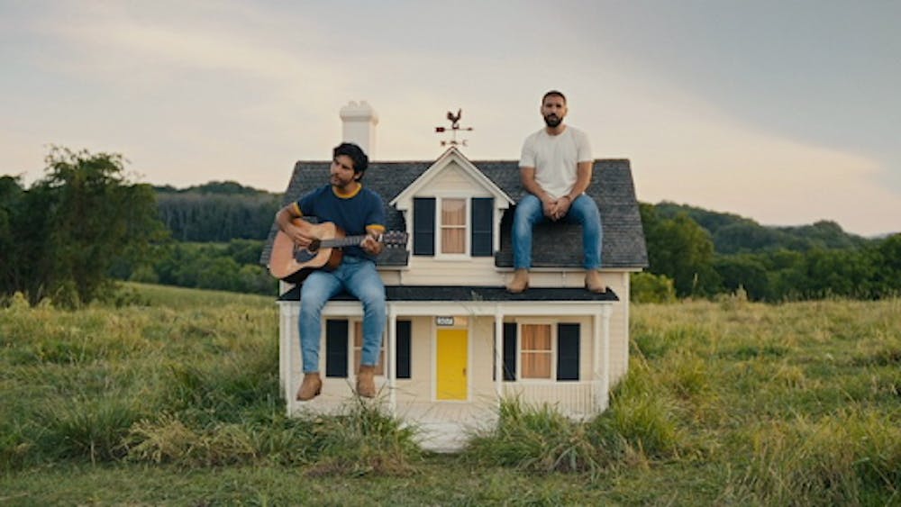 <p><em>Smyers and Mooney’s unwavering commitment to creating songs that resonate deeply with both the human experience and their own lives is evident within this musical masterpiece (Photo courtesy of </em><a href="https://music.apple.com/us/music-video/bigger-houses/1696825811" target=""><em>Apple Music</em></a><em>).</em></p>