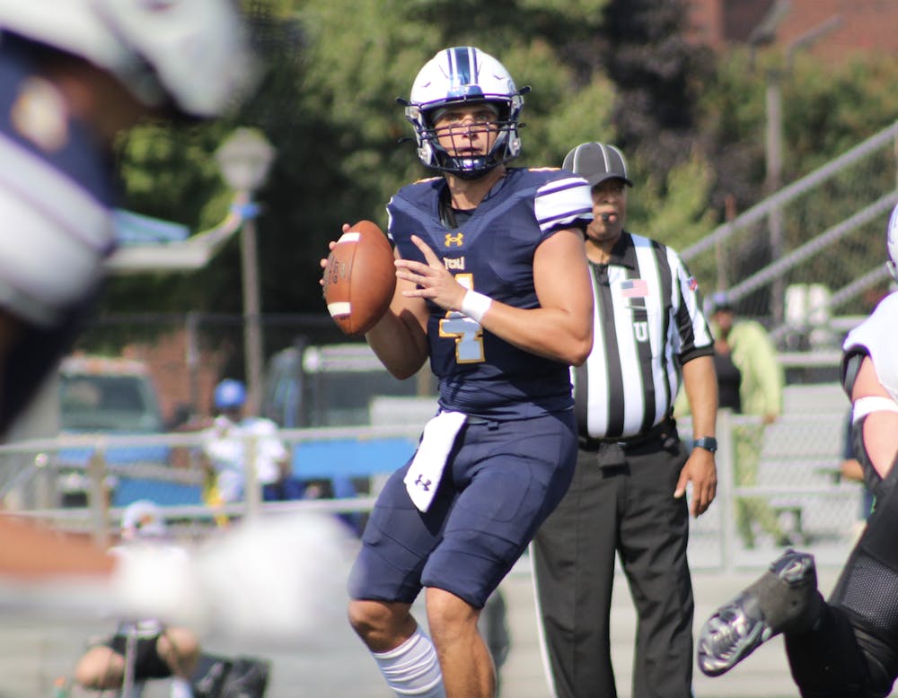 <p><em>Senior Trevor Bopp surveying the field for the Lions (Photo Courtesy of Elizabeth Gladstone).﻿</em></p>