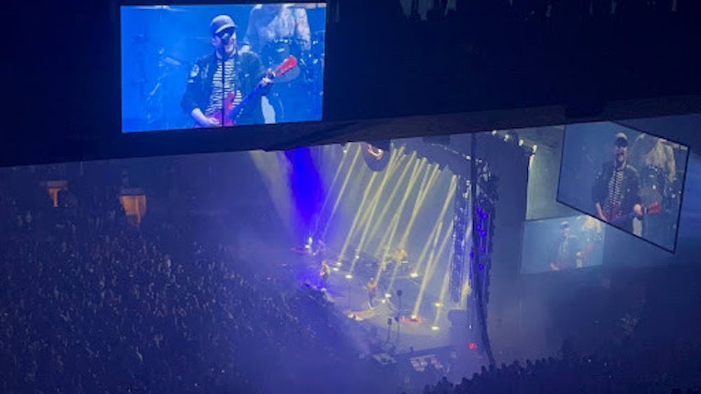 <p><em>Fall Out Boy maintained a constant and blaring stage presence throughout the show (Photo courtesy of Lake DiStefano / Staff Writer).</em></p>