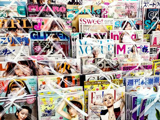 A newsstand in Tokyo displays an array of Japanese fashion and culture magazines. (Photo courtesy of Wikimedia Commons)