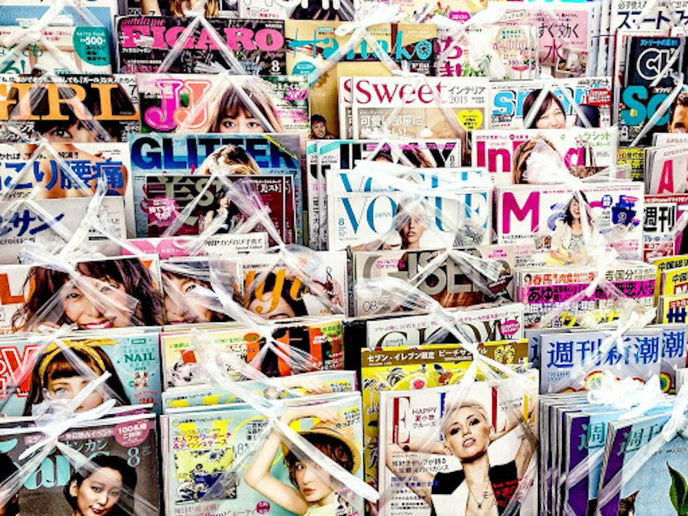 <p><em>A newsstand in Tokyo displays an array of Japanese fashion and culture magazines. (Photo courtesy of </em><a href="https://commons.wikimedia.org/wiki/File:Preventing_people_reading_magazines_for_free_in_Tokyo_2013_(9567403595).jpg" target=""><em>Wikimedia Commons</em></a><em>)</em></p>