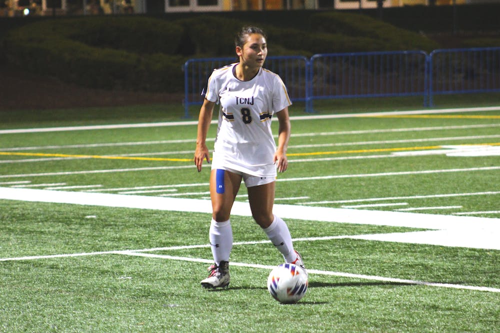 <p><em>Senior Ava Curtis possesses the ball ﻿(Photo courtesy of Elizabeth Gladstone).</em></p>