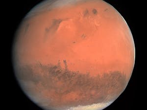 Major discoveries were made about Mars, changing the way astronomers and scientists will look at the planet forever (Photo courtesy of Wikimedia Commons/“OSIRIS Mars true color” by ESA &amp; MPS for OSIRIS Team MPS/UPD/LAM/IAA/RSSD/INTA/UPM/DASP/IDA. February 24, 2007). 