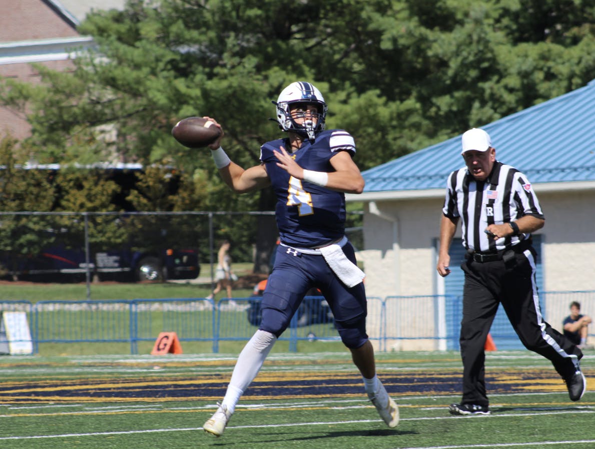 Senior quarterback Trevor Bopp on a pass (Photo courtesy of Elizabeth Gladstone / Multimedia Coordinator).