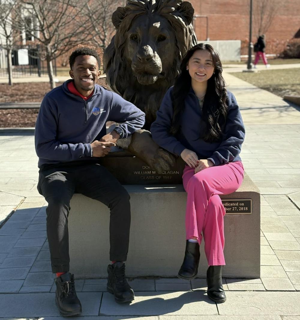 <p><em>Jared Williams (left) and Trish Le (right) talk about what’s to come in the Spring semester (Photo by Raeanne Raccagno). </em></p>