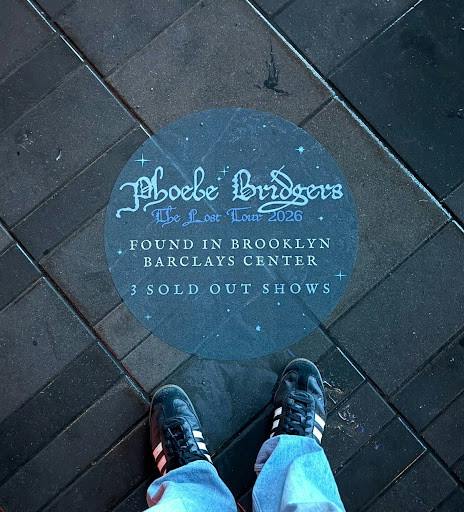 Ground stickers around Barclays Center give fans unique photo opportunities outside the arena before abandoning their phones. (Photo by Andre Paras / Managing Editor)