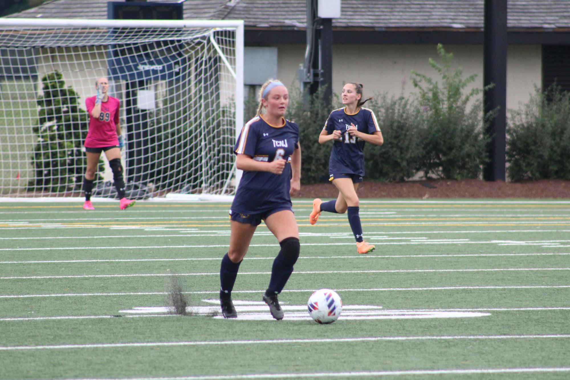 Defender Caroline Rebele (13) and midfielder Victoria D'Imperio (6) (Photo courtesy of Elizabeth Gladstone / Multiamedia Coordinator).