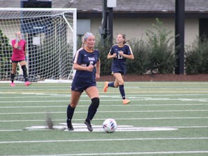 Defender Caroline Rebele (13) and midfielder Victoria D'Imperio (6) (Photo courtesy of Elizabeth Gladstone / Multiamedia Coordinator).