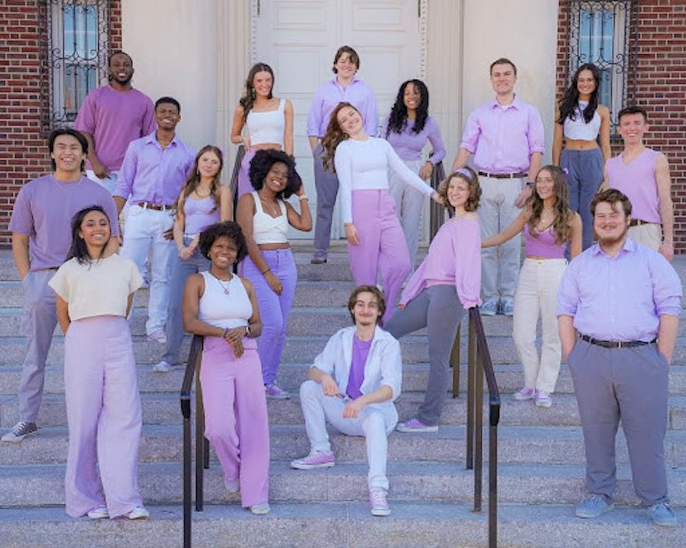 <p><em>The Trentones posed in front of Green Hall during a photoshoot. (Photo courtesy of Nikos Degruccio)</em></p>