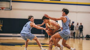 Junior guard Nick Koch had 32 points in the losing effort. (Photo courtesy of Arion Owes)