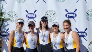Members of women’s club crew after placing second in The Head of the Passaic Regatta (Courtesy of Jordan Galan).