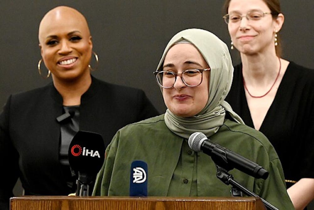 <p><em>Rümeysa Öztürk, a Tufts University graduate student, addresses reporters at a press conference on May 12, 2025. (Photo courtesy of </em><a href="https://commons.wikimedia.org/wiki/File:R%C3%BCmeysa_%C3%96zt%C3%BCrk_addresses_reporters_at_press_conference_(2025).jpg" target=""><em>Wikimedia Commons</em></a><em>)</em></p>