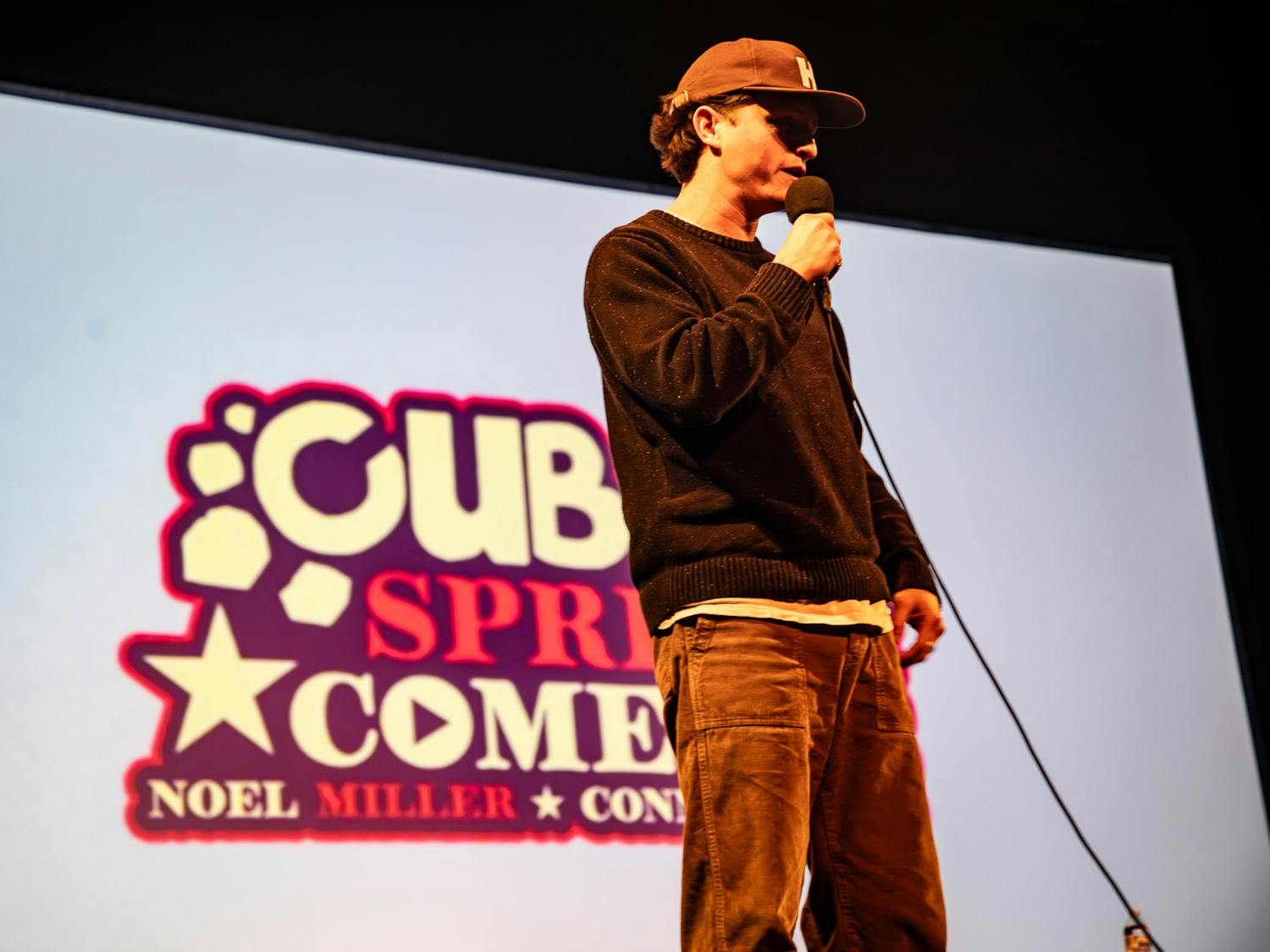 Comedian Connor Wood takes the stage at Kendall Hall for CUB's Spring Comedy Show. (Photo courtesy of Andre Paras)
