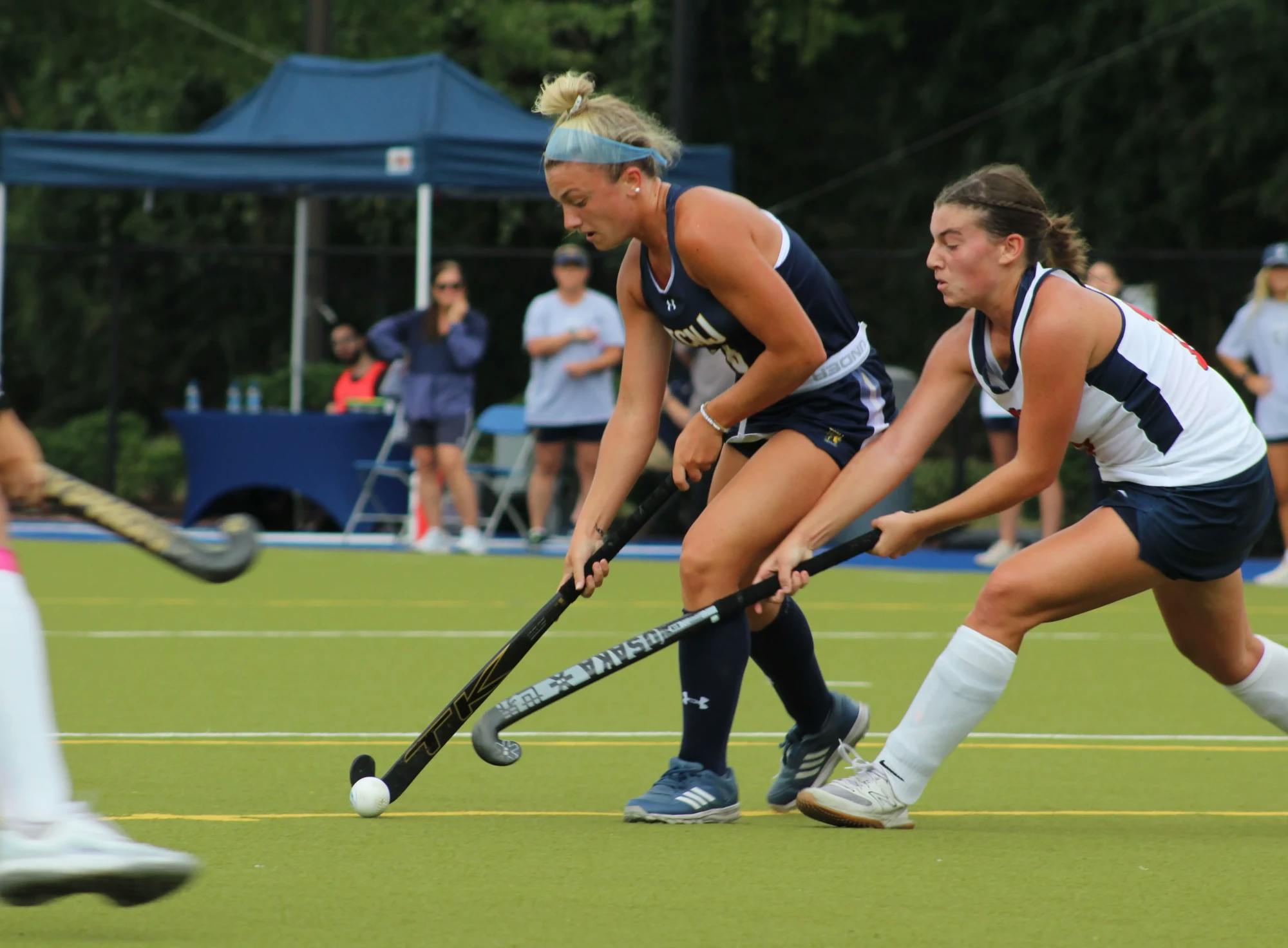 A Lions player keeping the ball away from two defenders (Photo courtesy of Elizabeth Gladstone).﻿