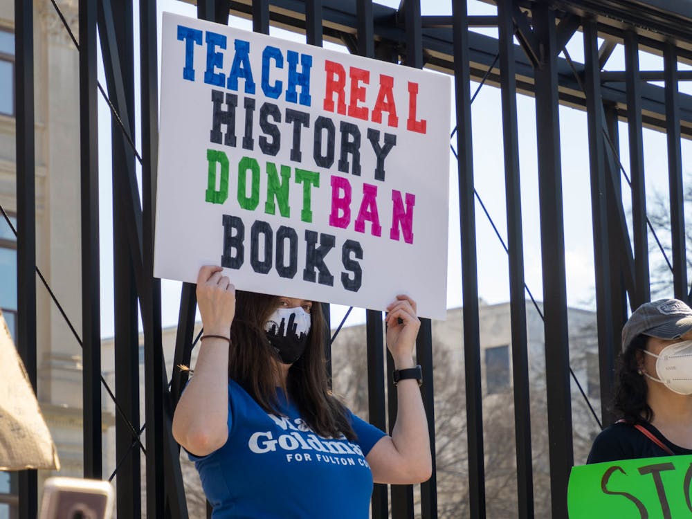 <p><em>Book bans are on the rise in U.S. schools, with over 10,000 reported between 2023 and 2024. (Photo courtesy of </em><a href="https://commons.wikimedia.org/wiki/File:Book_Banning_Protest,_Atlanta,_GA_2-12-2022_P2120143_(51878737310).jpg" target=""><em>Wikimedia Commons</em></a><em> / John Ramspott, Feb. 12, 2022)</em></p>