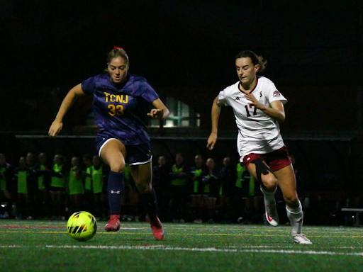 The College’s Ava Vissagio carries the ball through midfield against Stevens forward Alina Friz.