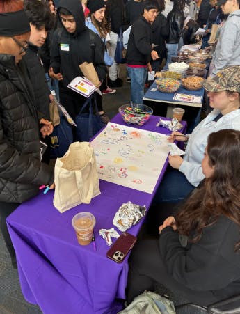 Dr. Martin Luther King Jr. Middle School students visit information stations at The College of New Jersey in March. (Photo courtesy of Marissa Bellino)