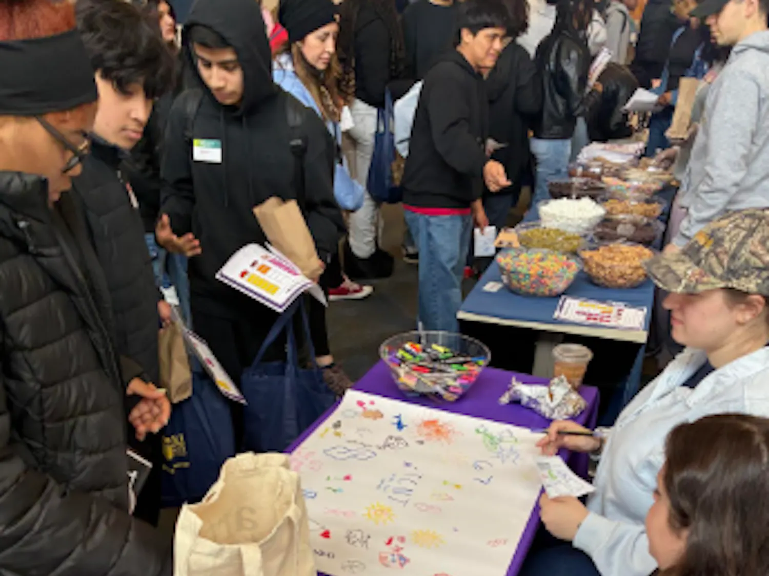 Dr. Martin Luther King Jr. Middle School students visit information stations at The College of New Jersey in March. (Photo courtesy of Marissa Bellino)
