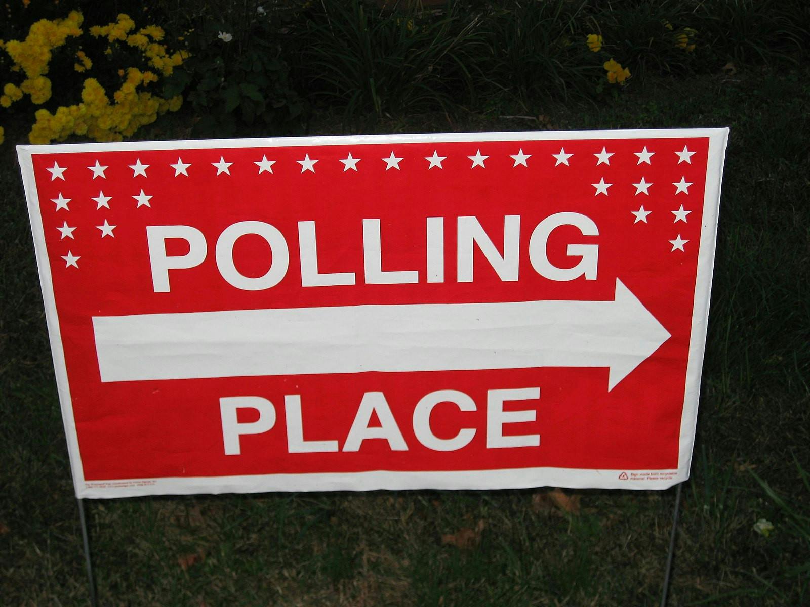 Polls show Harris and Trump undergoing an intense battle as they fight for the popular vote (Photo courtesy of Wikimedia Commons / “Election - November 2, 2010 - Polling Place Sign (5141729818)” by Mrs. Gemstone from USA. November 2, 2010). 