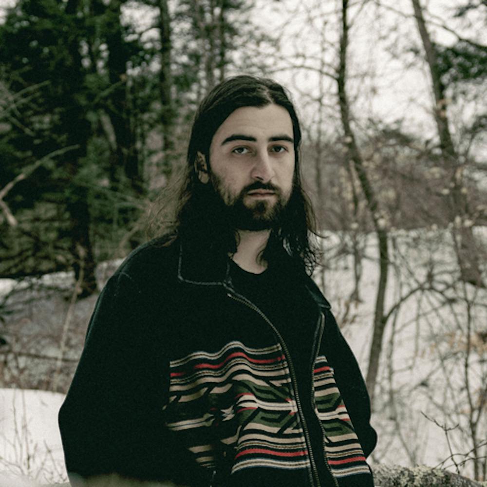 <p>Kahan gained fame by centering his song themes around New England, creating a vibe reminiscent of northern Appalachia with a curated “granola” feel (Photo courtesy of <a href="https://music.apple.com/us/artist/noah-kahan/328583953" target="">Apple Music</a>).</p>