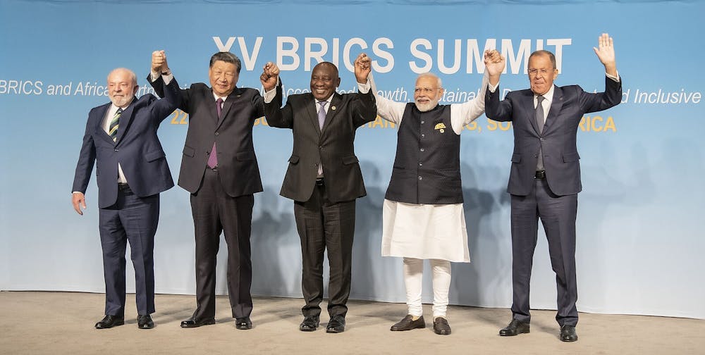 <p><em>The BRICS organization hosted the annual BRICS summit from Oct. 22-24 with several global leaders (Photo courtesy of Wikimedia Commons / “</em><a href="https://commons.wikimedia.org/wiki/File:XV_BRICS_Summit_family_photo.jpg" target=""><em>XV BRICS Summit family photo</em></a><em>” by 15th BRICS SUMMIT. August 23, 2023). </em></p>