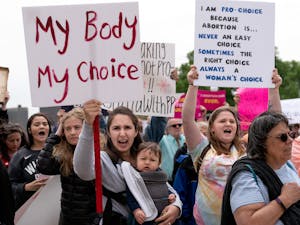 (“My body my choice sign at a Stop Abortion Bans Rally in St Paul, Minnesota” by Lorie Shaull, 2019).