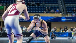 Junior Nick Sacco in his bout (Photo courtesy of John Haddad).