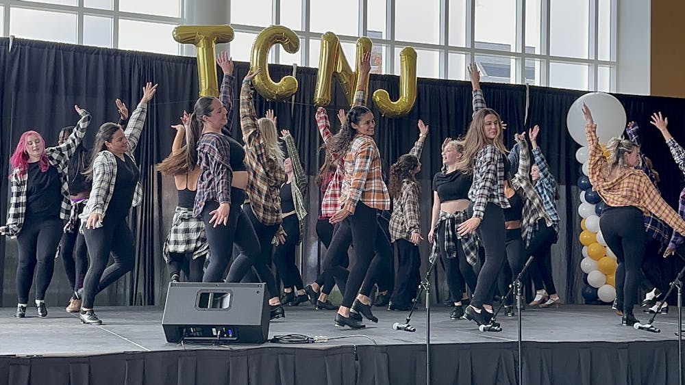 <p><em>The College&#x27;s Tap Ensemble, performing for Homecoming, 2023. (Photo by Briana Keenan / Correspondent)</em></p>