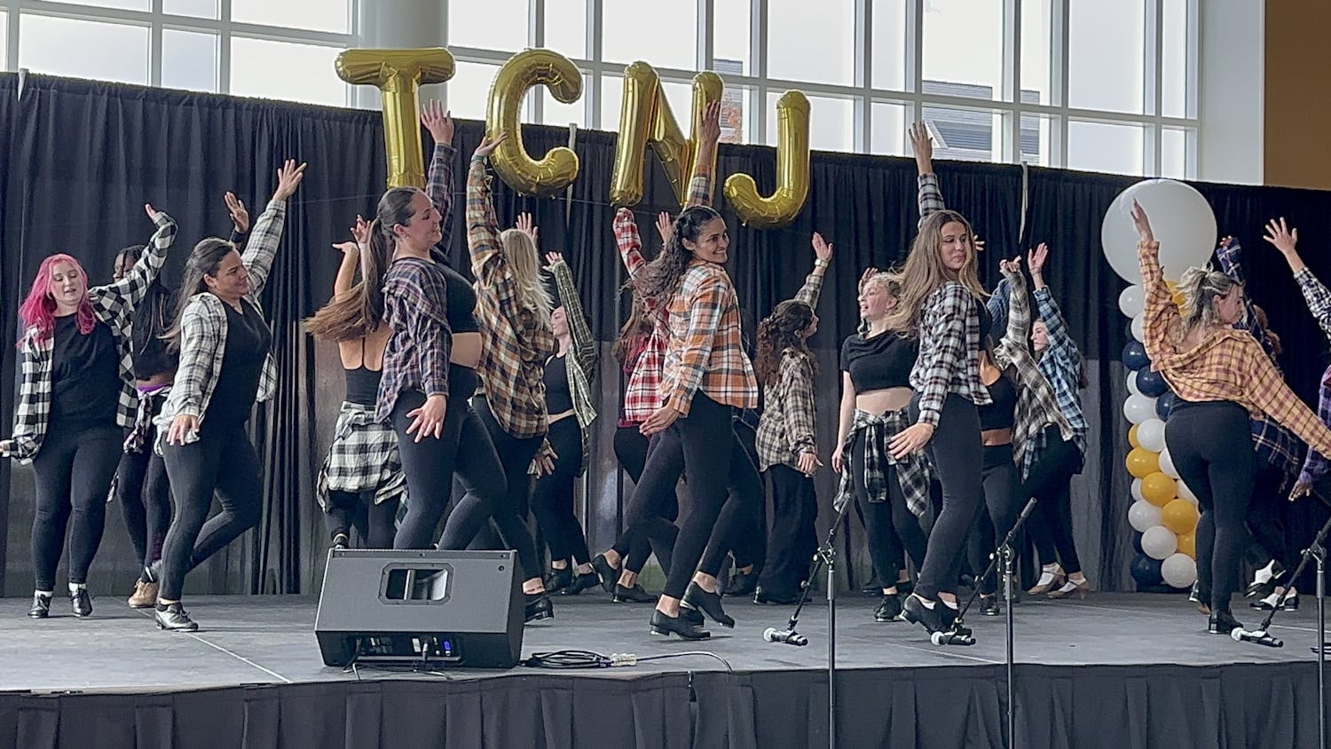 The College&#x27;s Tap Ensemble, performing for Homecoming, 2023. (Photo by Briana Keenan / Correspondent)