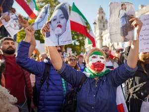 Just days after the one year anniversary of the death of a young Iranian woman, Mahsa Amini, Iran’s parliament has approved a new Hijab and Chasity Bill that delineates stricter punishments for failure to adhere to the Islamic dress code (Photo courtesy of Wikimedia Commons/“Mahsa Amini Protest - 8 October 2022 - Parliament Square, London” by Alisdare Hickson. October 8, 2022).