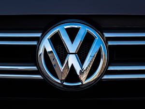 Volkswagen announced their plans to close three of their factories in Germany (Photo courtesy of Wikimedia Commons / “VOLKSWAGEN badge on a car” by Ivan Radic. February 27, 2019).