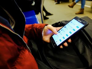 Social Media should have more user-controlled content moderation. (Photo courtesy of Flickr,“Girl Checking her Instagram” by Themeisle, Feb 2, 2019)